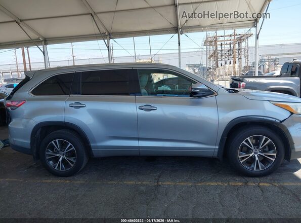 5TDJKRFHXGS286026 2016 TOYOTA HIGHLANDER Gray Vista interior trasera