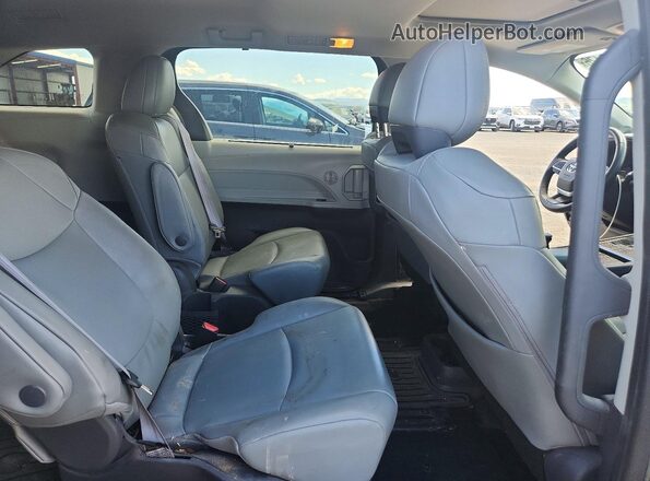 5TDJSKFC8MS026716 2021 TOYOTA SIENNA Green Rear interior view