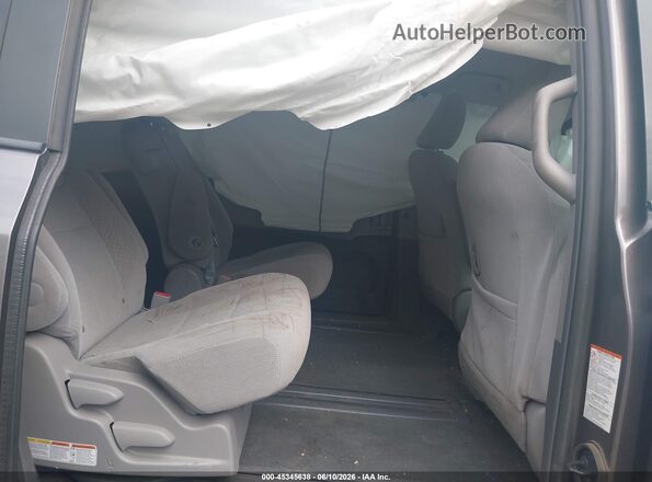 5TDKK3DC6GS738580 2016 TOYOTA SIENNA Gray VIN կոդի պիտակի տեսք