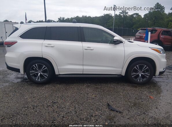 5TDKKRFH5GS129153 2016 TOYOTA HIGHLANDER White Widok wnętrza z tyłu