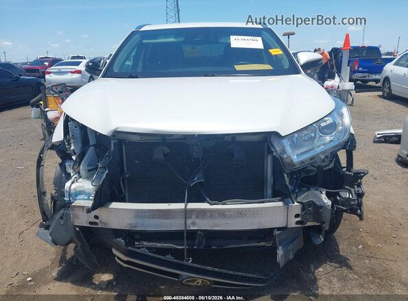 5TDKZRFH2JS536382 2018 TOYOTA HIGHLANDER White Rear interior view