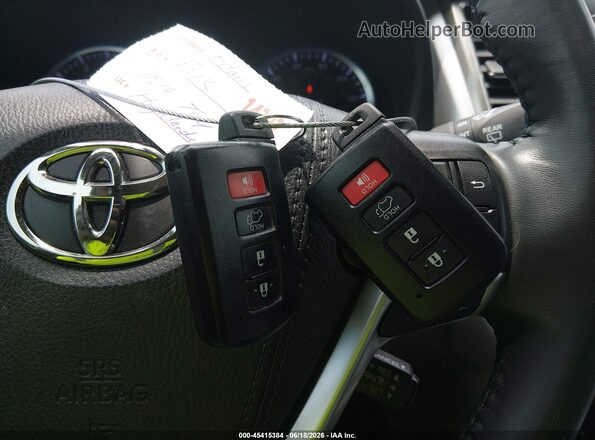 5TDKZRFH4KS355978 2019 TOYOTA HIGHLANDER Silver Dashboard view