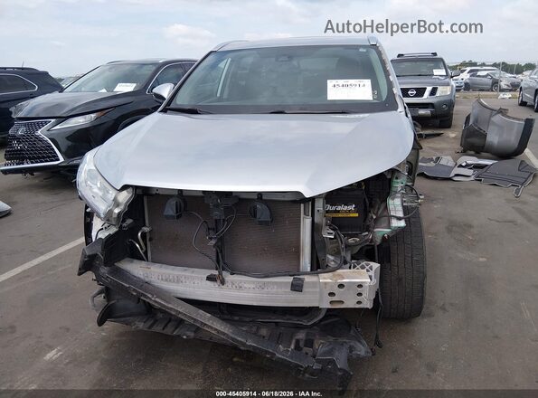 5TDKZRFH4KS556313 2019 TOYOTA HIGHLANDER Серебряный Вид задней части салона