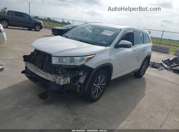5TDKZRFH6KS556734 2019 TOYOTA HIGHLANDER White Front left