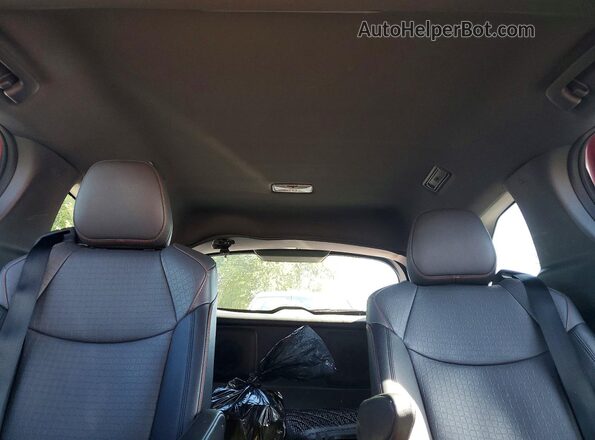 5TDXSKFC7PS077221 2023 TOYOTA SIENNA Red Rear seats view
