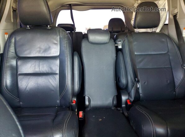 5TDXZ3DCXKS974496 2019 TOYOTA SIENNA Black Rear seats view