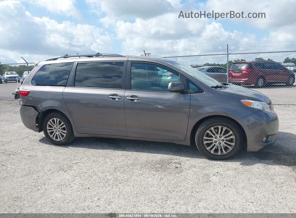 5TDYK3DC6GS718775 2016 TOYOTA SIENNA Gray Rear interior view