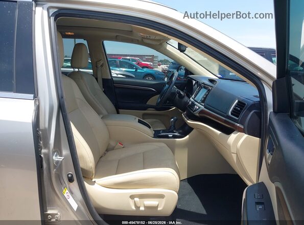 5TDYKRFH0GS144153 2016 TOYOTA HIGHLANDER Gold Widok wnętrza z przodu