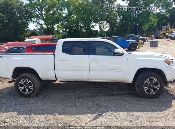 5TFBZ5DN3JX004294 2018 TOYOTA TACOMA White Rear interior view