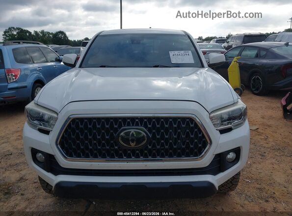 5TFCZ5AN3KX185990 2019 TOYOTA TACOMA Белый Вид щитка приборов