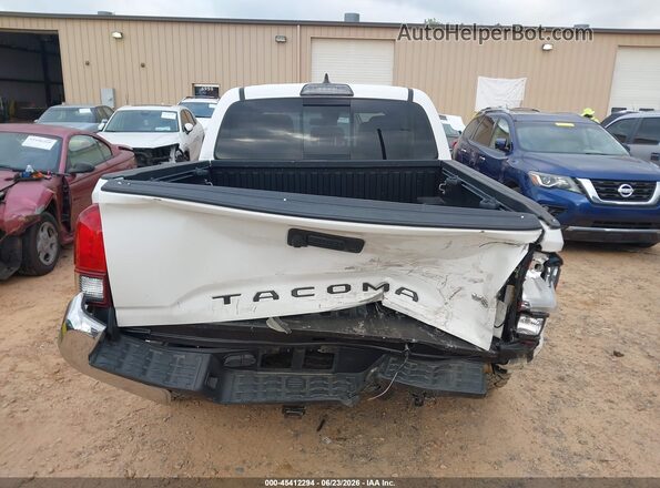 5TFCZ5AN3KX185990 2019 TOYOTA TACOMA Белый Вид спереди