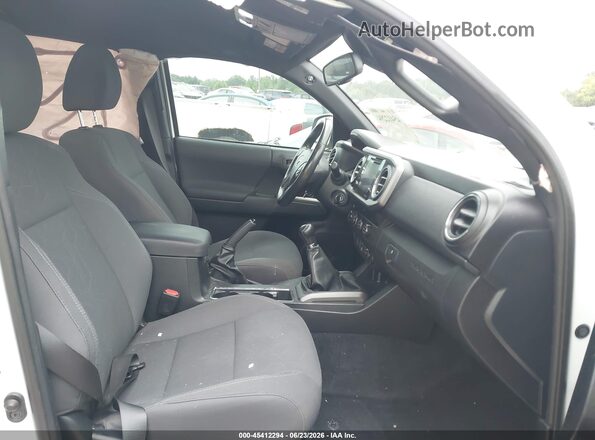 5TFCZ5AN3KX185990 2019 TOYOTA TACOMA Белый Вид салона спереди