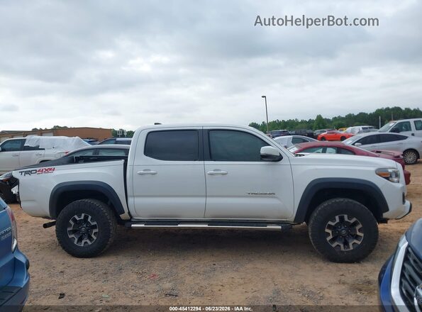 5TFCZ5AN3KX185990 2019 TOYOTA TACOMA Белый Вид задней части салона