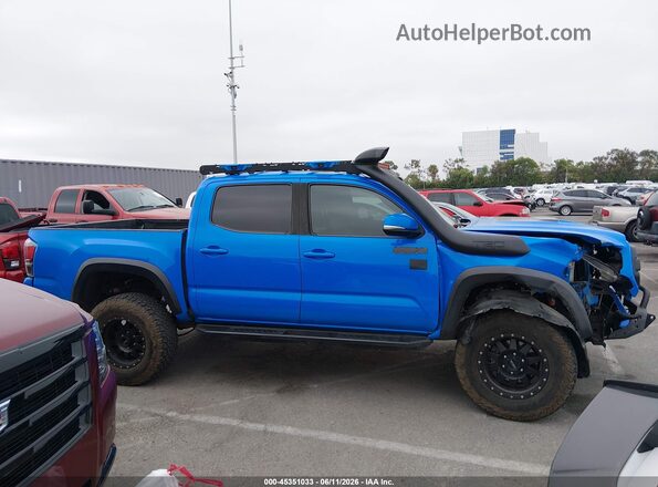 5TFCZ5AN5KX182976 2019 TOYOTA TACOMA Blue Rear interior view