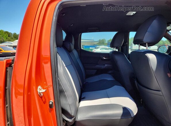 5TFCZ5AN7GX010973 2016 TOYOTA TACOMA Orange უკანა სავარძლების ხედი
