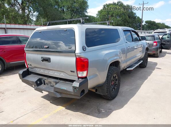 5TFDZ5BN2GX002959 2016 TOYOTA TACOMA Silver Trasero derecho