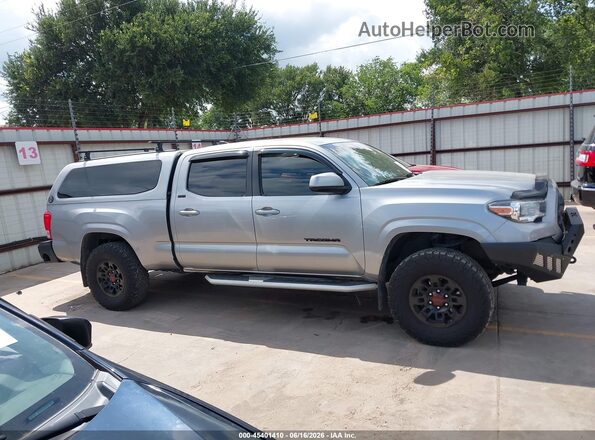 5TFDZ5BN2GX002959 2016 TOYOTA TACOMA Silver Vista interior trasera