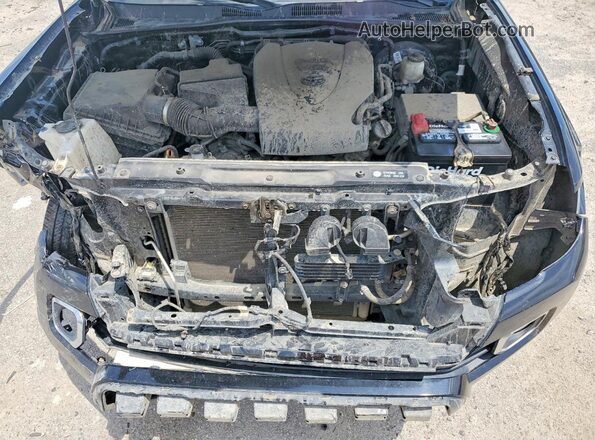 5TFGZ5AN8KX175358 2019 TOYOTA TACOMA Черный Вид задней части салона