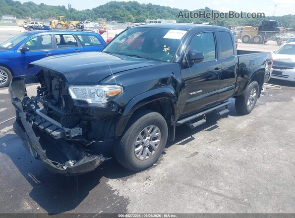 5TFSX5ENXKX069374 2019 TOYOTA TACOMA Black Vista tres cuartos delantera izquierda