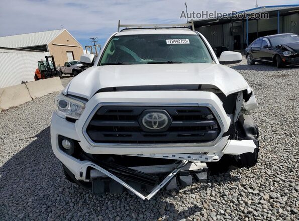 5TFSZ5AN0KX178832 2019 TOYOTA TACOMA White Вид спереду