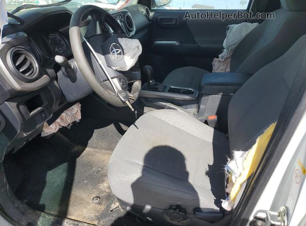 5TFSZ5AN0KX178832 2019 TOYOTA TACOMA White Вид салону спереду