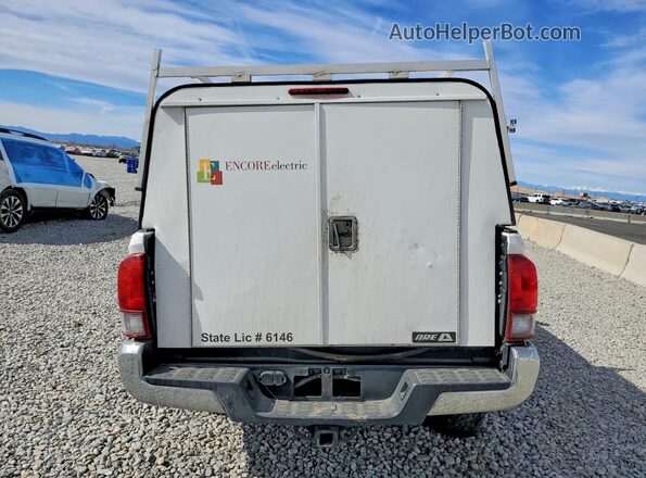 5TFSZ5AN0KX178832 2019 TOYOTA TACOMA White Вид ззаду