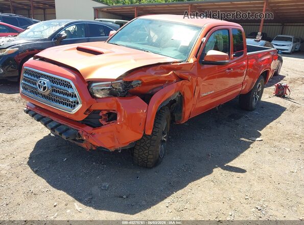 5TFSZ5ANXGX006198 2016 TOYOTA TACOMA Orange წინა მარცხენა ხედი სამი მეოთხედიდან