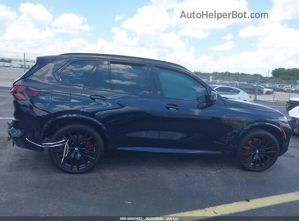 5UX13EU05T9256880 2026 BMW X5 Blue Widok wnętrza z tyłu