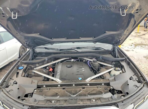 5UX23EM03S9W24587 2025 BMW X7 Gray Engine compartment view