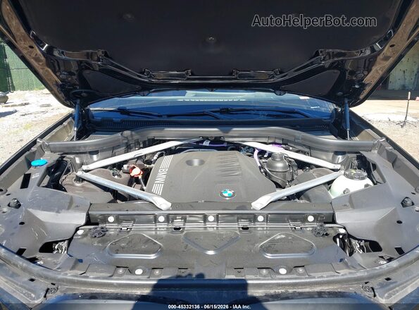 5UX23EM03T9360644 2026 BMW X7 Black Rear view