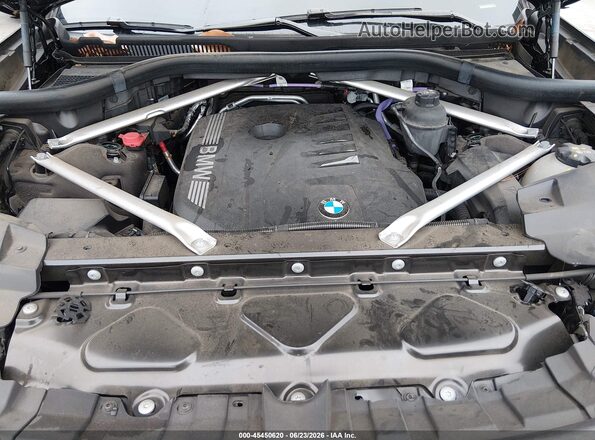 5UX23EM04R9V50607 2024 BMW X7 Black Вид ззаду