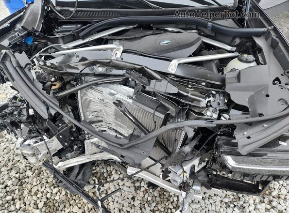 5UX23EM04S9W51796 2025 BMW X7 Black Вид задньої частини салону