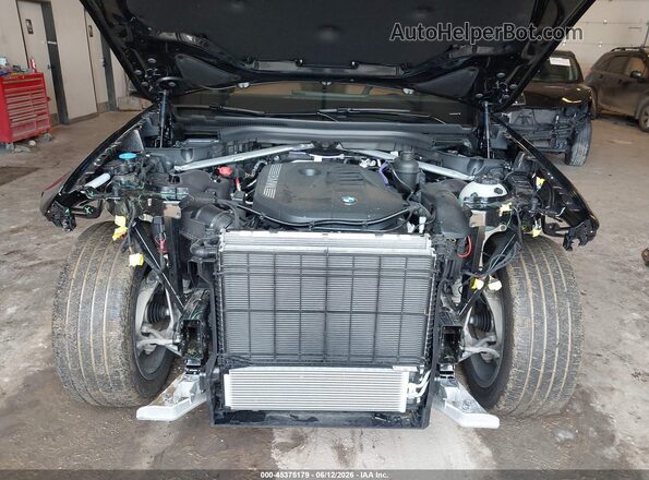 5UX23EM05T9330609 2026 BMW X7 Black Rear view
