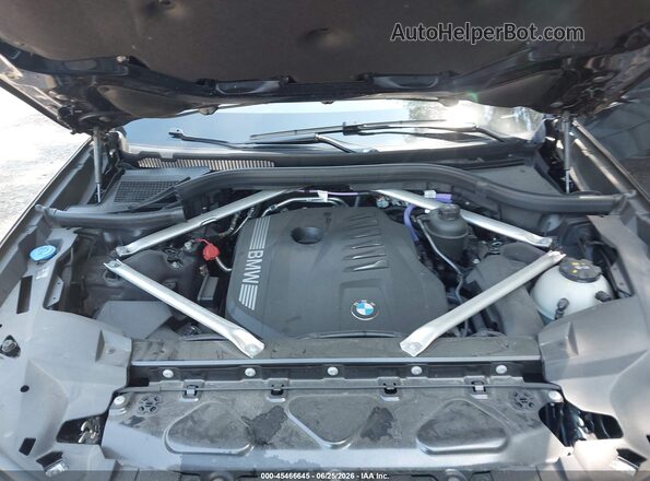 5UX23EM06T9078045 2026 BMW X7 Black Vista trasera
