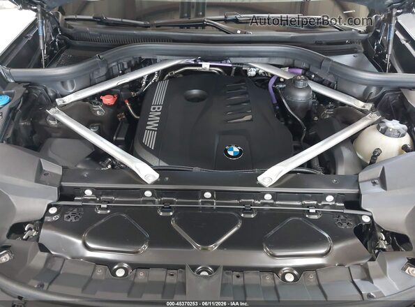 5UX23EM09T9074121 2026 BMW X7 Gray Vista trasera