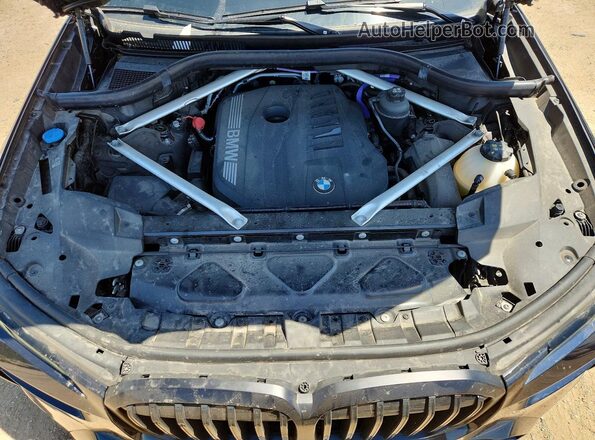 5UX23EM0XR9S57309 2024 BMW X7 Синий Вид задней части салона