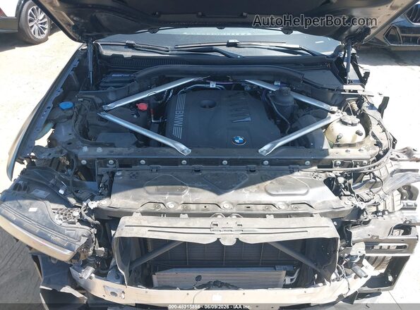 5UX23EM0XR9U98254 2024 BMW X7 Black Widok z tyłu