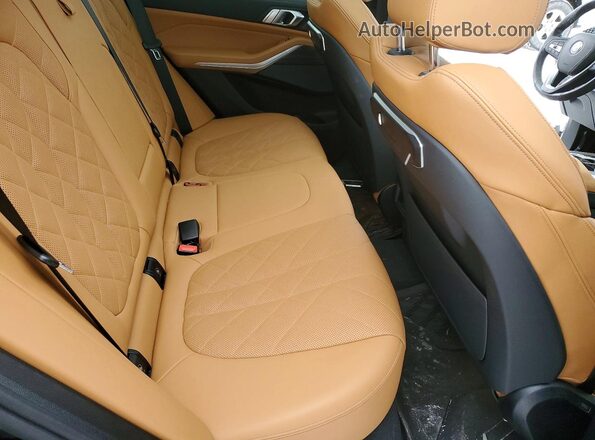 5UX23EU02R9V32428 2024 BMW X5 Black Rear interior view