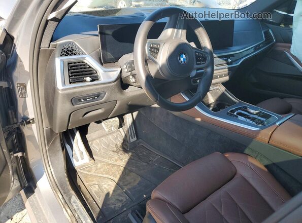 5UX23EU04R9V24671 2024 BMW X5 Silver Вид панелі приладів