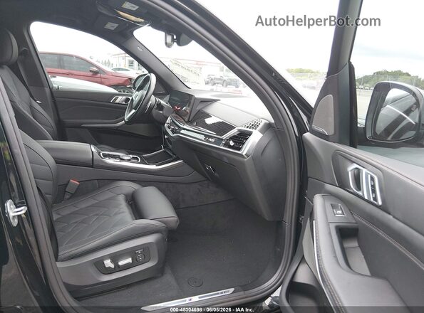 5UX23EU08R9W00103 2024 BMW X5 Black Vista interior delantera
