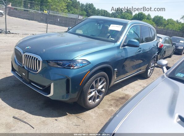 5UX23EU08S9X62318 2025 BMW X5 Cream წინა მარცხენა ხედი სამი მეოთხედიდან