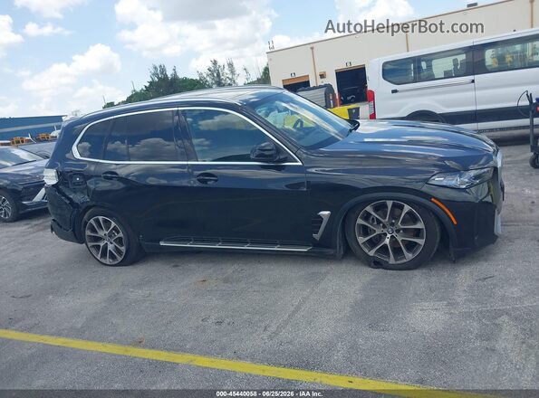 5UX23EU08T9111739 2026 BMW X5 Black Vista interior trasera