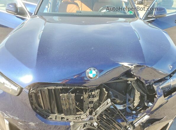 5UX23EU0XS9W78386 2025 BMW X5 Blue Vista del compartimento del motor