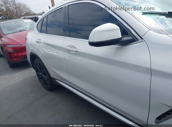 5UX2V1C02LLE67985 2020 BMW X4 White Սալոնի հետևի տեսք