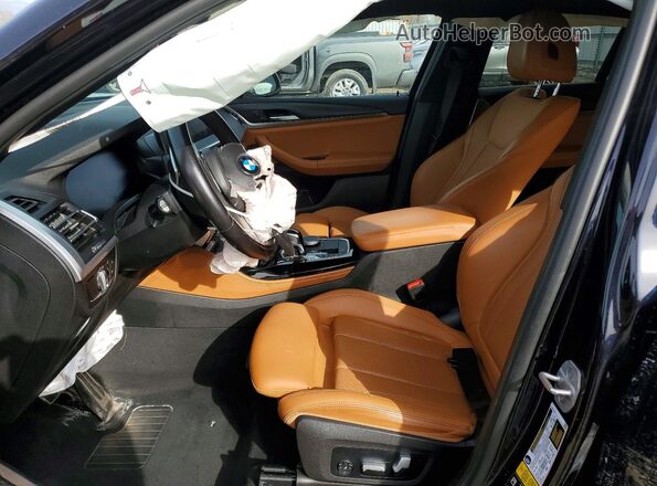 5UX33DT00N9K76476 2022 BMW X4 Blue Front interior view