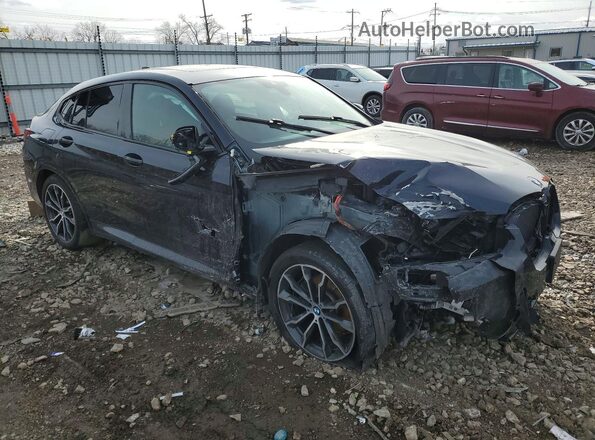 5UX33DT00N9K76476 2022 BMW X4 Blue Front right