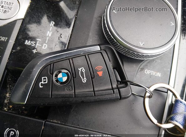 5UX33DT00N9L32299 2022 BMW X4 Black Առջևի վահանակի տեսք
