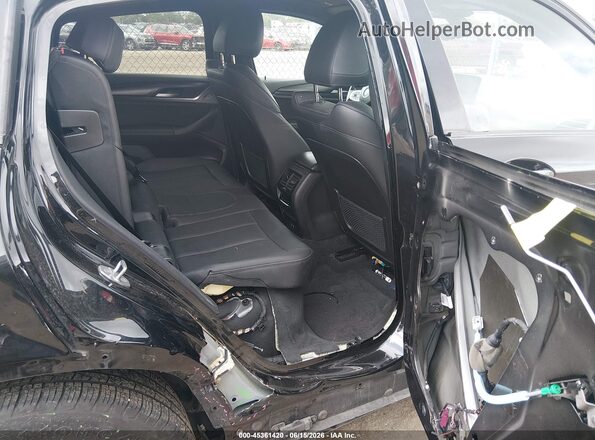 5UX33DT00N9L32299 2022 BMW X4 Black VIN կոդի պիտակի տեսք