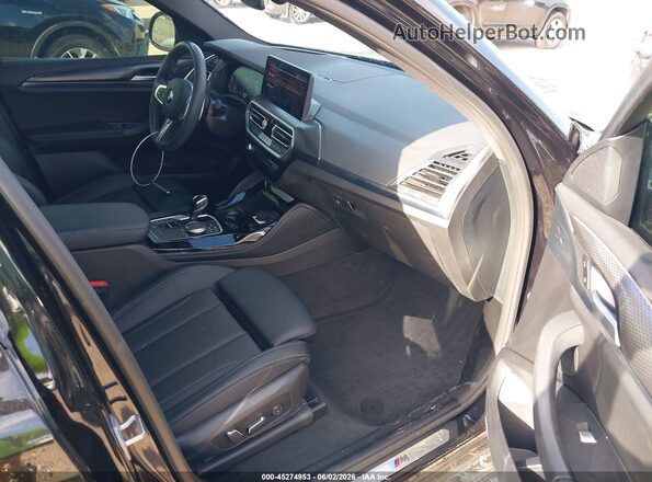 5UX33DT02R9U35651 2024 BMW X4 Black Widok wnętrza z przodu