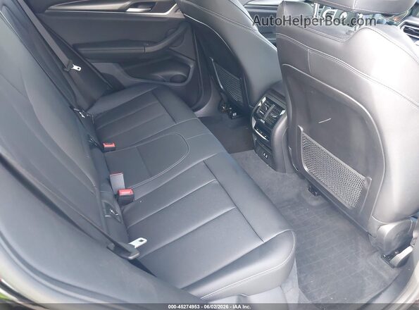 5UX33DT02R9U35651 2024 BMW X4 Black Widok naklejki z numerem VIN